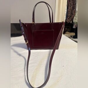 Tory Burch bag 
Burgundy
